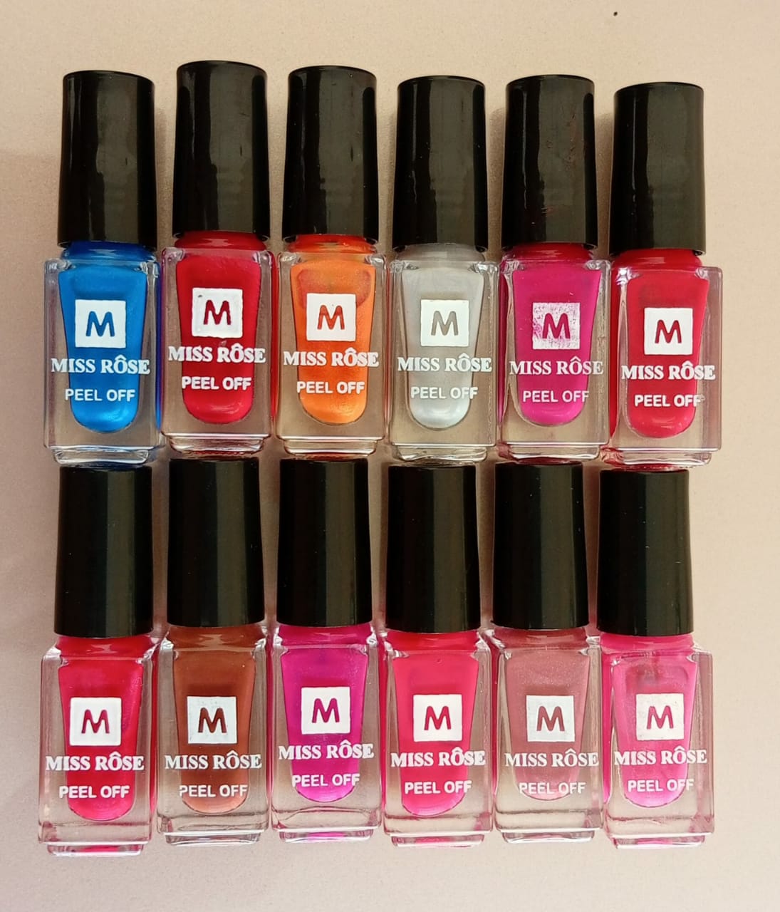 12 Pcs Miss Rose Peel Off Nail Paint Set – Assorted Colors Easy to Apply Nail Polish